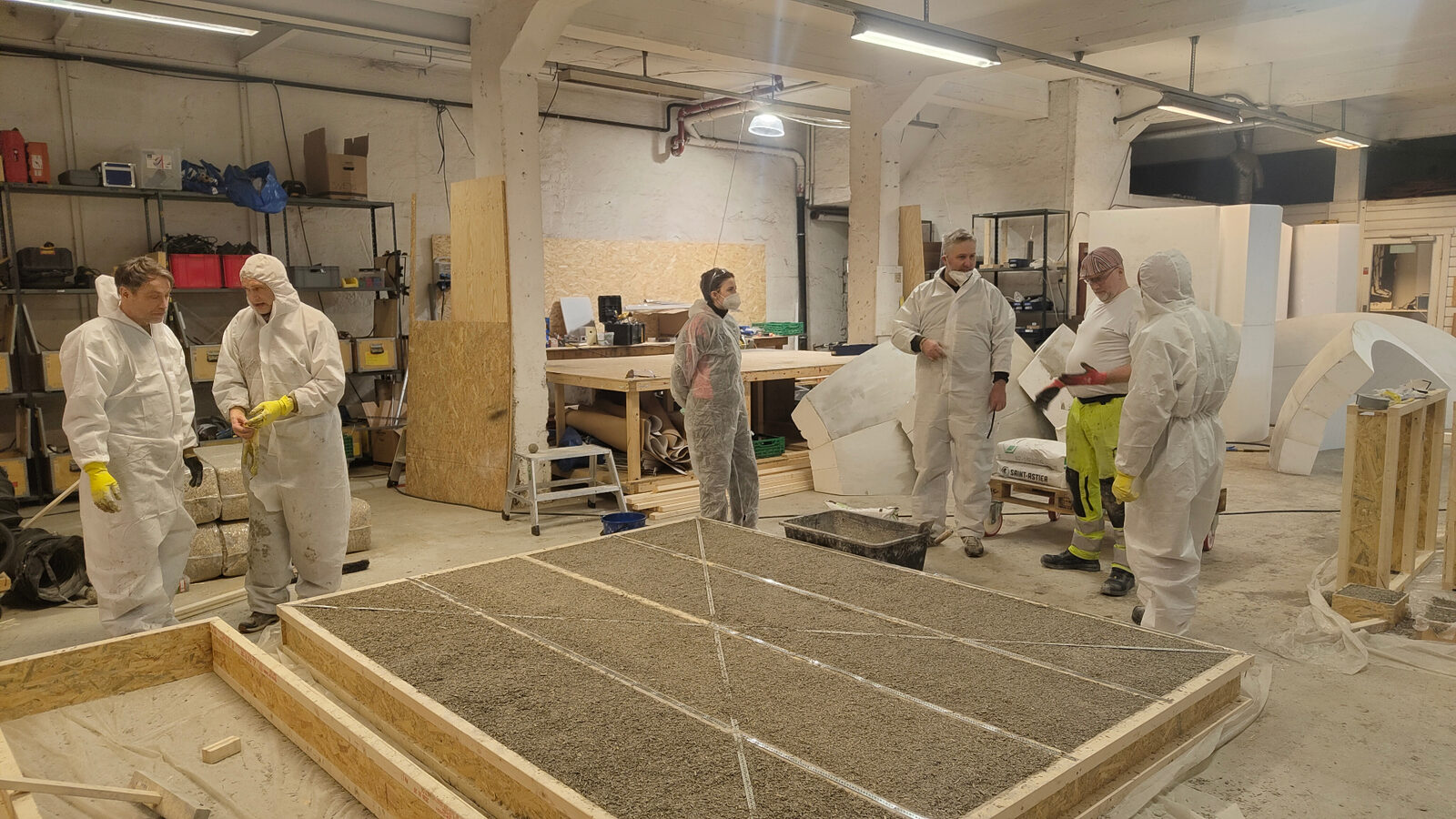Hands-on hempcrete construction training in a timber-framed workshop
